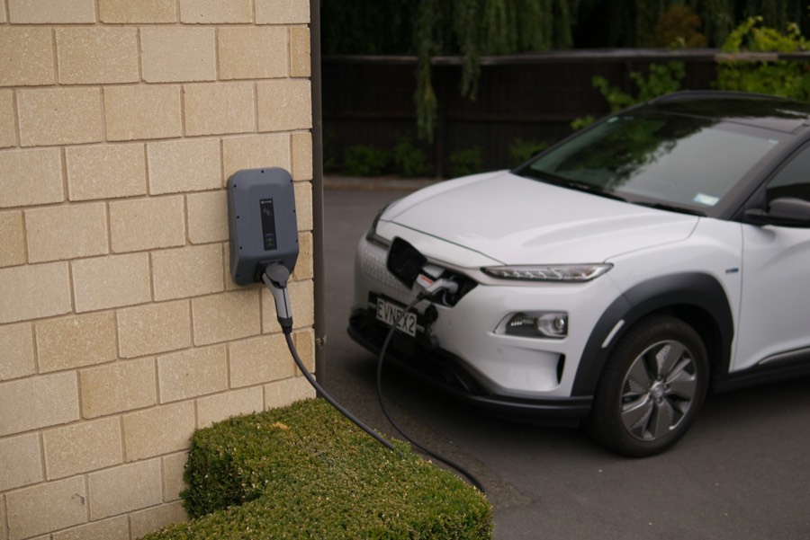 Electric car charging from a wall-mounted home charger